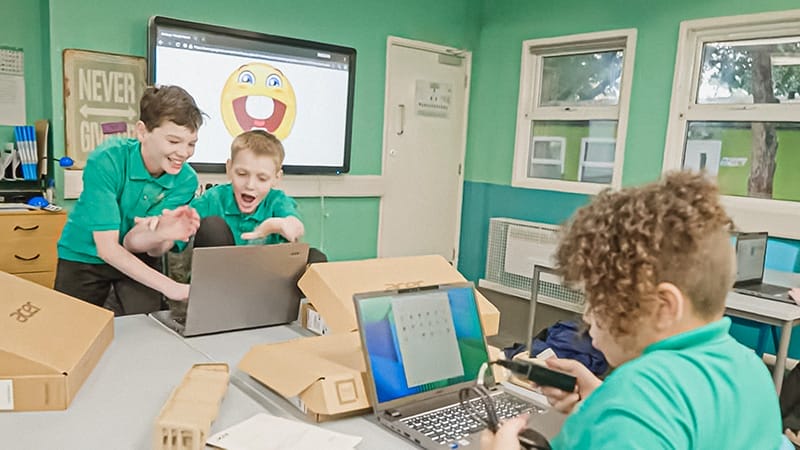 Students working on Acer TravelMate